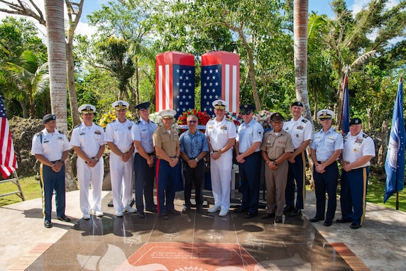 U.S. Navy Rear Adm. Brent DeVore, commander, Joint Region Marianas, center right, retired U.S. Army Lt. Col. David S. Okada, center left, and other military leaders on Guam attend a 9/11 remembrance ceremony at Two Lovers Point, Sept. 20.