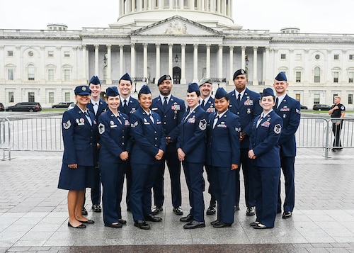The 12 Outstanding Airmen of the Year for 2024 pose for a photo outside the U.S. Capitol building, Washington, D.C., Sept. 17, 2024. Selected for their exceptional leadership, job performance and personal achievement, the 12 Airmen will spend the next year serving as ambassadors for the Air Force. (U.S. Air Force photo by Staff Sgt. Stuart Bright)