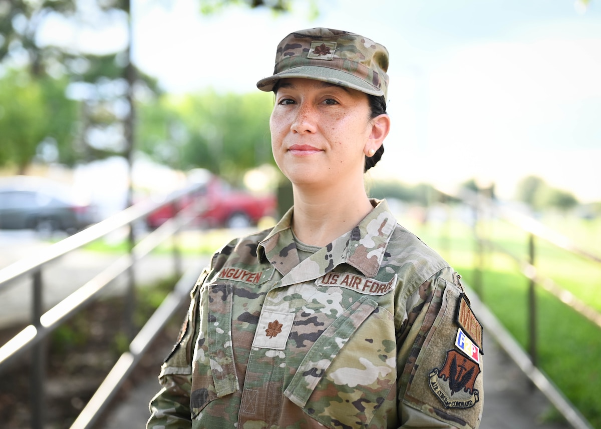 Maj. Nguyen smiles for a photo.