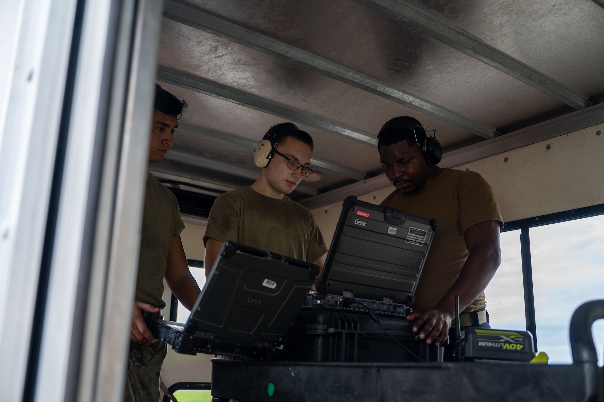 From right to left, Staff Sgt. Edward Oldham, 4th Reconnaissance Squadron Crew Chief, Airman 1st Class Zachery Gibson, 4 RS Crew Chief, and Airman 1st Class Andres Galarza, 4 RS Avionics system Journeymen, perform aircraft launch procedures from the Vehicle Test Controller on an RQ-4B Global Hawk aircraft on Andersen Air Force Base, Guam, Sept. 17, 2024. The Global Hawk is controlled and piloted by Rated Pilots trained in operating unmanned systems. The Crew consists of a Launch and Recovery Element (LRE) pilot, Mission Control Element (MCE) pilot, and a sensor operator. (U.S. Air Force Airman 1st Class Manasseh Demissie)