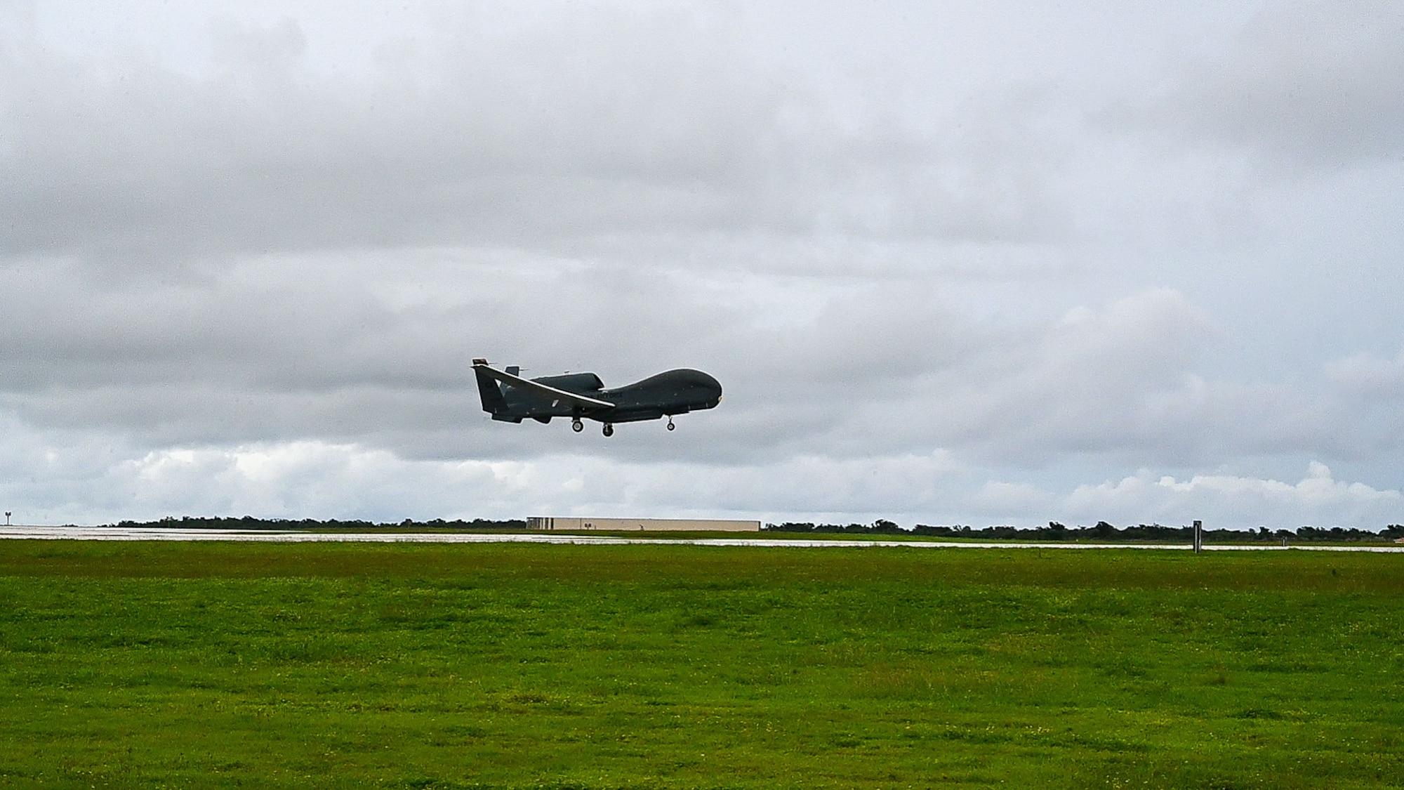 An RQ-4B Global Hawk takes off on Andersen Air Force Base, Guam, Sept. 17, 2024.  The RQ-4B operates the Ground Moving Target Indicator radar and possesses Synthetic Aperture Radar imagery capabilities. (U.S. Air Force Airman 1st Class Manasseh Demissie)