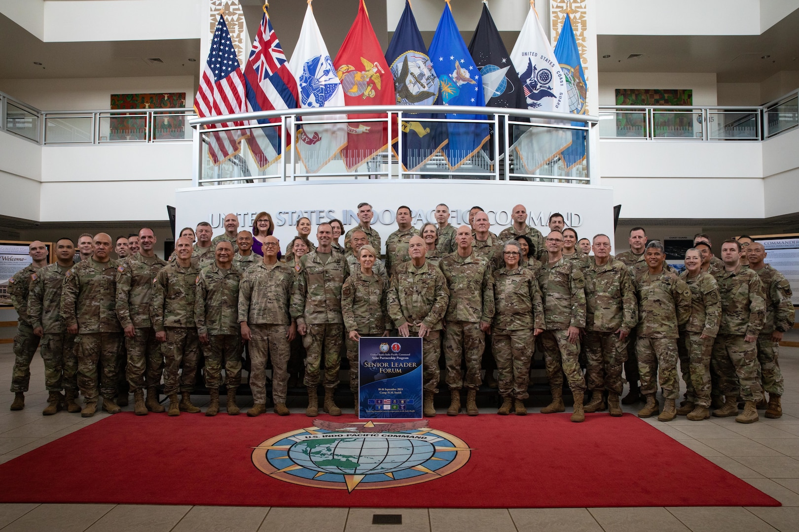 U.S. Air Force and Army adjutant generals, senior enlisted leaders and distinguished visitors pose for a group photo at the conclusion of the 2024 State Partnership Program’s senior leader forum at Camp H.M. Smith, Hawaii, Sep. 16, 2024.