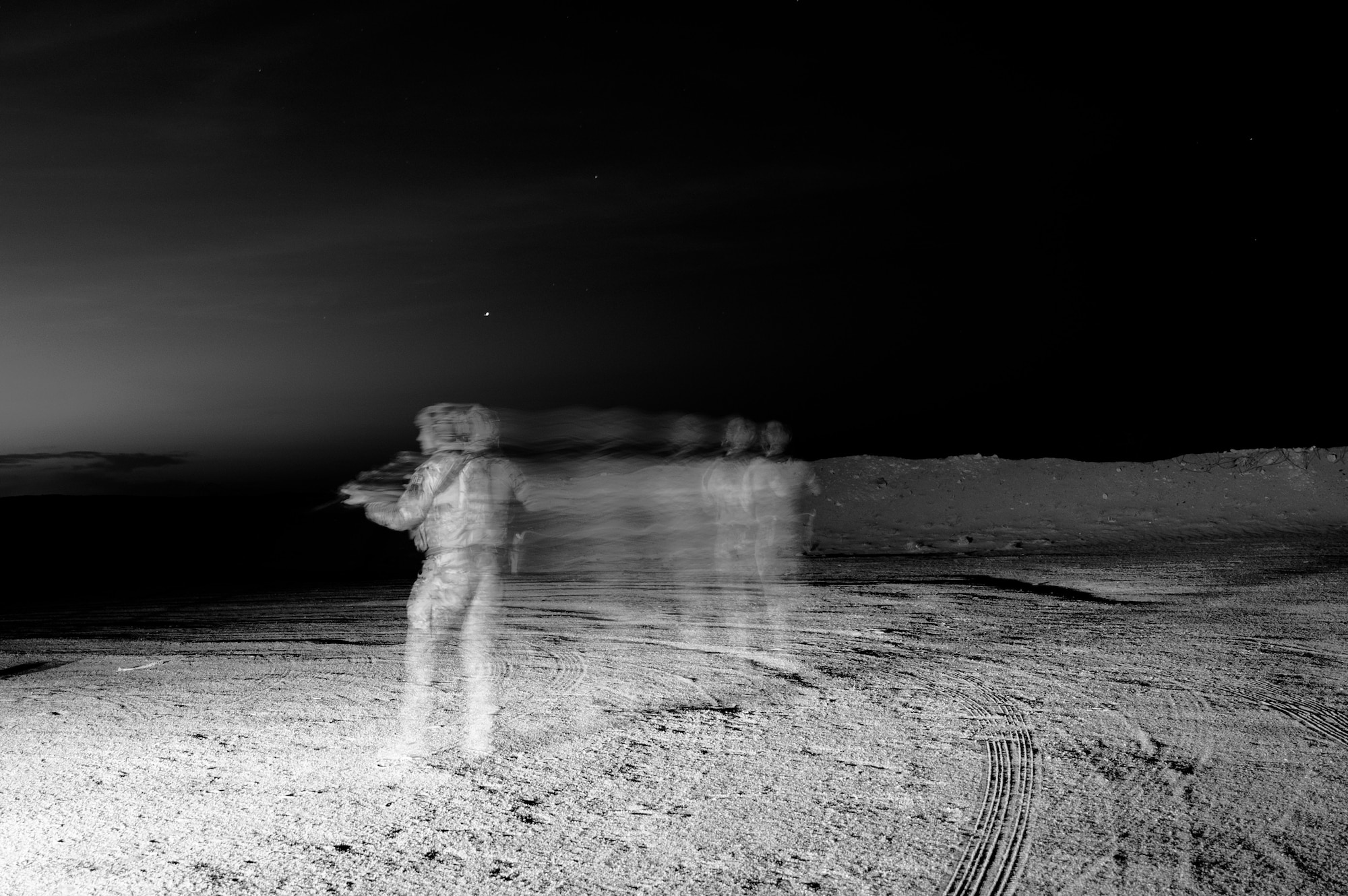 U.S. Air Force Master Sgt. Philip Sneed, 378th Expeditionary Security Forces Squadron operations superintendent, is posted to enhance security during a patrol at an undisclosed location within the U.S. Central Command area of responsibility, Aug. 6, 2024. Sneed is currently completing his final weeks in a security forces unit, preparing to excel in his next chapter as a first sergeant.  (U.S. Air Force photo by Senior Airman Ryan Hayman)