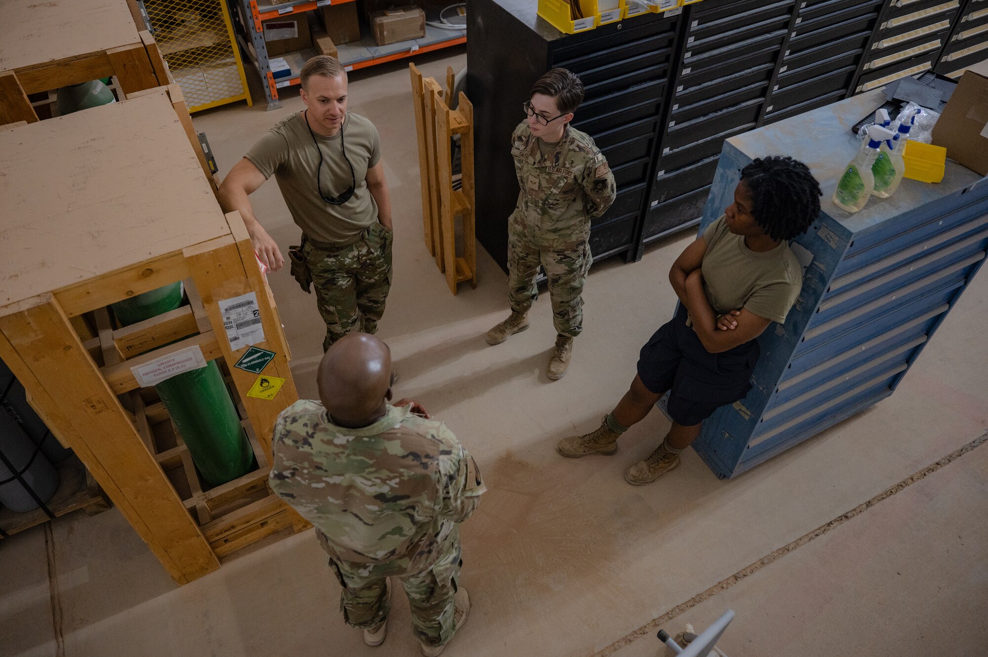 U.S. Air Force 1st Lt. Brian Stone, 378th Expeditionary Communications Squadron plans and resources flight commander, speaks to a group of 378th Logistics Readiness Squadron Airmen at an undisclosed location within the U.S. Central Command area of responsibility, July 12, 2024. Mission-Ready Airmen Cross Utilization Training provides Airmen specific training to perform tasks outside their primary Air Force Specialty Code. (U.S. Air Force photo)