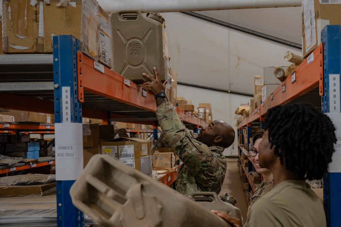 U.S. Air Force 1st Lt. Brian Stone, 378th Expeditionary Communications Squadron plans and resources flight commander, integrates alongside 378th Expeditionary Logistics Readiness Squadron Airmen at an undisclosed location within the U.S. Central Command area of responsibility, July 12, 2024. The Mission-Ready Airmen concept a shift from traditional, large force packages of highly specialized teams toward smaller, multidisciplinary teams that can provide combat support and solve problems with the available resources. (U.S. Air Force photo)