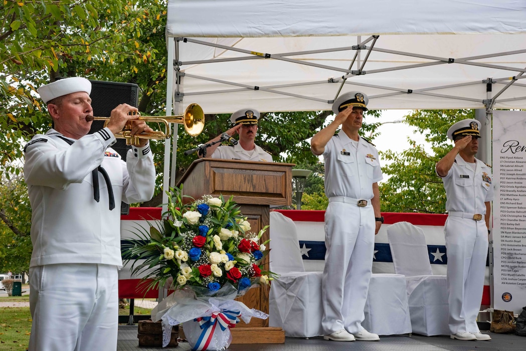 Musician 1st Class Justin Maliza, assigned to the U.S. 7th Fleet Band, performs taps to signal the end of the annual Bells Across America For Fallen Service Members ceremony held at the Kosano Park onboard Commander, Fleet Activities Yokosuka (CFAY).