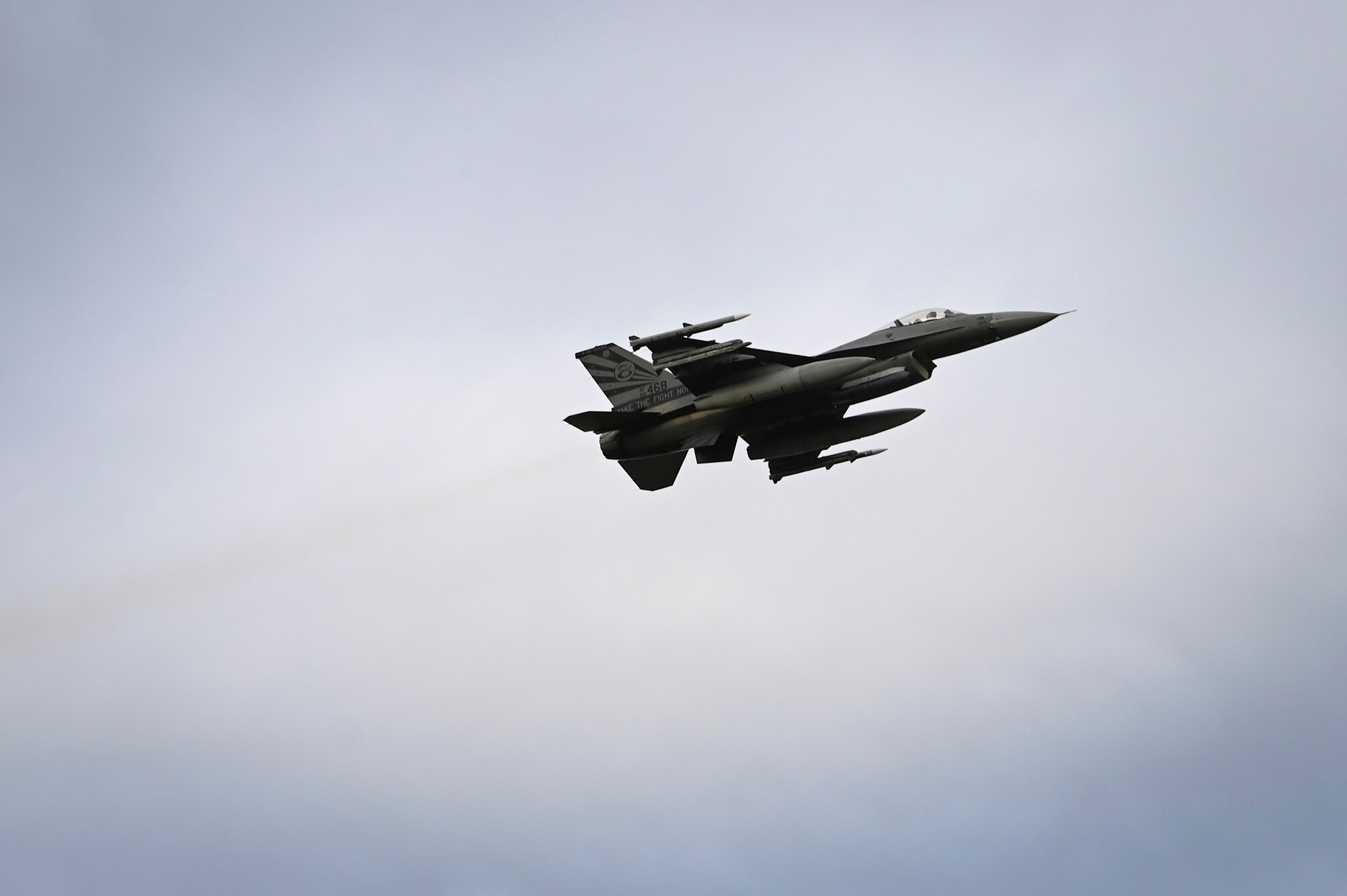 An F-16 Fighting Falcon assigned to the 8th Fighter Wing takes off from the flight line for a training mission.