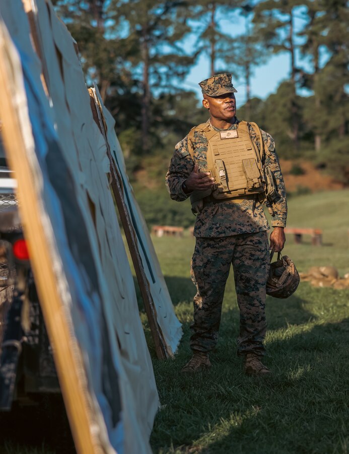 U.S. Marine Corps Brig. Gen. Anthony Henderson, commanding general of Training Command, speaks about the different targets before he participates in various rifle drills at Weapons Training Battalion on Marine Corps Base Quantico, Virginia, Sept. 5, 2024. Training Command develops, sustains, and enhances individual military knowledge, skills, and attitudes in Marines to meet warfighting requirements of the total force. (U.S. Marine Corps photo by Lance Cpl. Ethan Miller)
