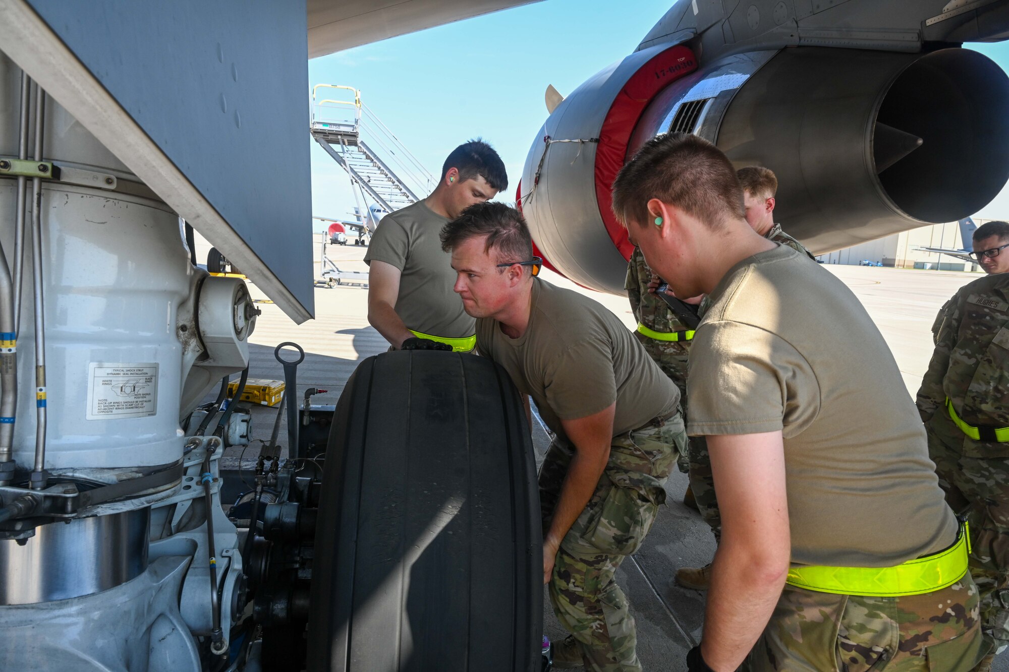 Crew chief trainees from the 373rd Training Squadron Detachment 8 train to repair a KC-46A Pegasus Sept. 18, 2024, at McConnell Air Force Base, Kansas. The maintenance sections in the Air Force are responsible for ensuring aircraft and equipment are operational and conducting inspections and repairs to maintain readiness and safety for mission success. (U.S. Air Force photo by Senior Airman William Lunn)