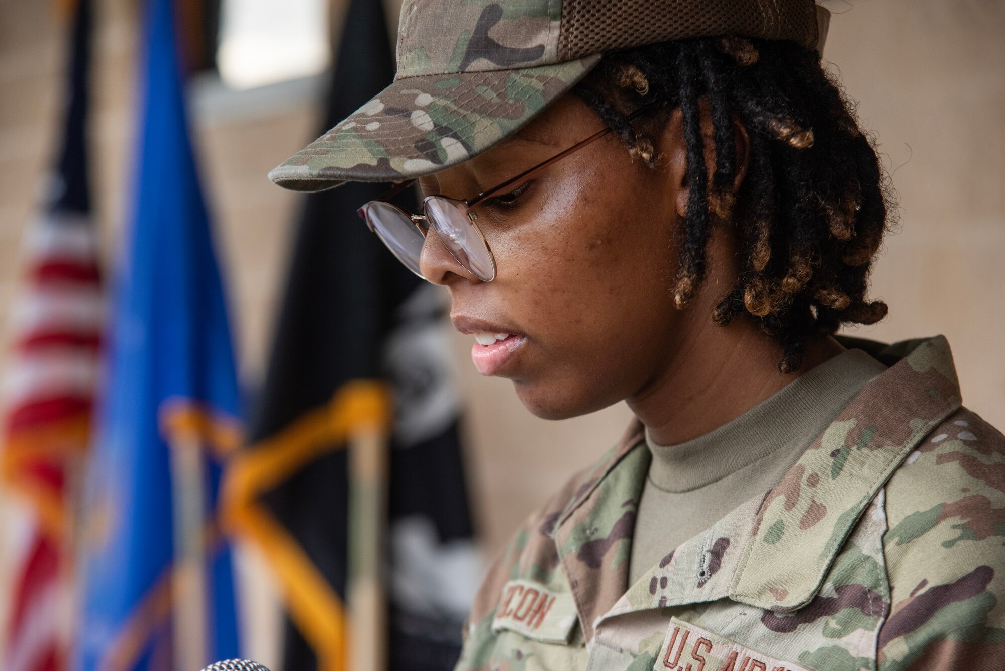 A1C Asia Bacon, 4th MUNS, reads names of prisoners of war (POW) and those missing in action (MIA) who didn’t make it home during a 24-hour vigil commemorating National POW/MIA Recognition Day.