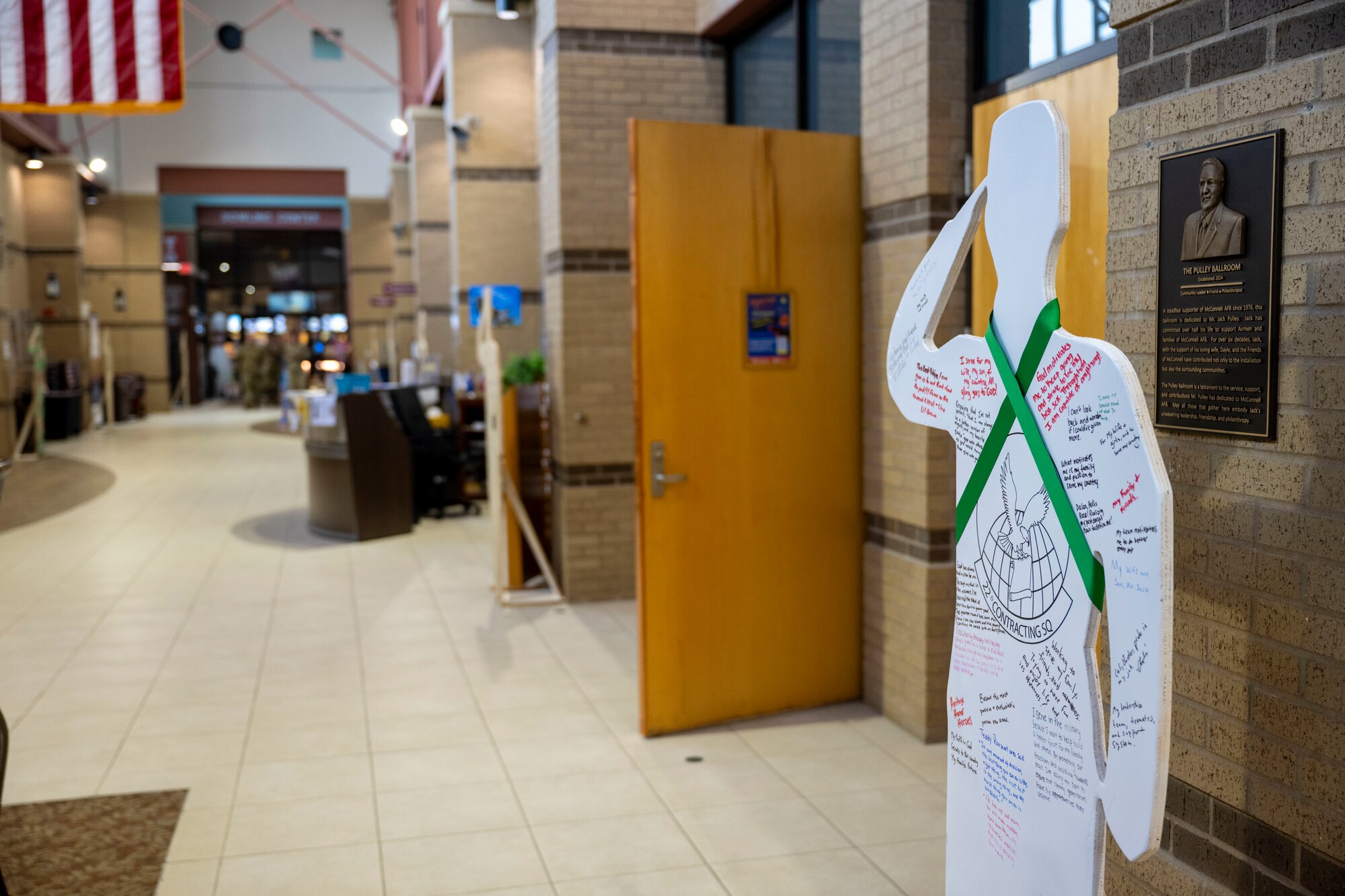 Wooden cutouts from each 22nd Air Refueling Wing squadron on display during the Suicide Awareness Month exhibit at McConnell Air Force Base, Kansas, Sept 18, 2024. The cutouts are on display at the Robert J. Dole Center from Sept. 18-30. (U.S. Air Force photo by Senior Airman Felicia Przydzial)