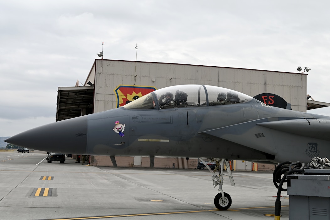 U.S. Air Force Maj. Gen. Duke Pirak, Deputy Director, Air National Guard, salutes before taxiing during his first flight.