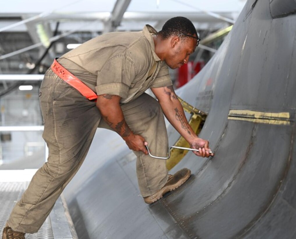 U.S. Air Force Senior Airman TreQuawn Tomlin, 34th Bomber Generation Squadron crew chief, performs maintenance on a B-1B Lancer in support of exercise Raider Reach at Ellsworth Air Force Base, S.D., Sept. 17, 2024.