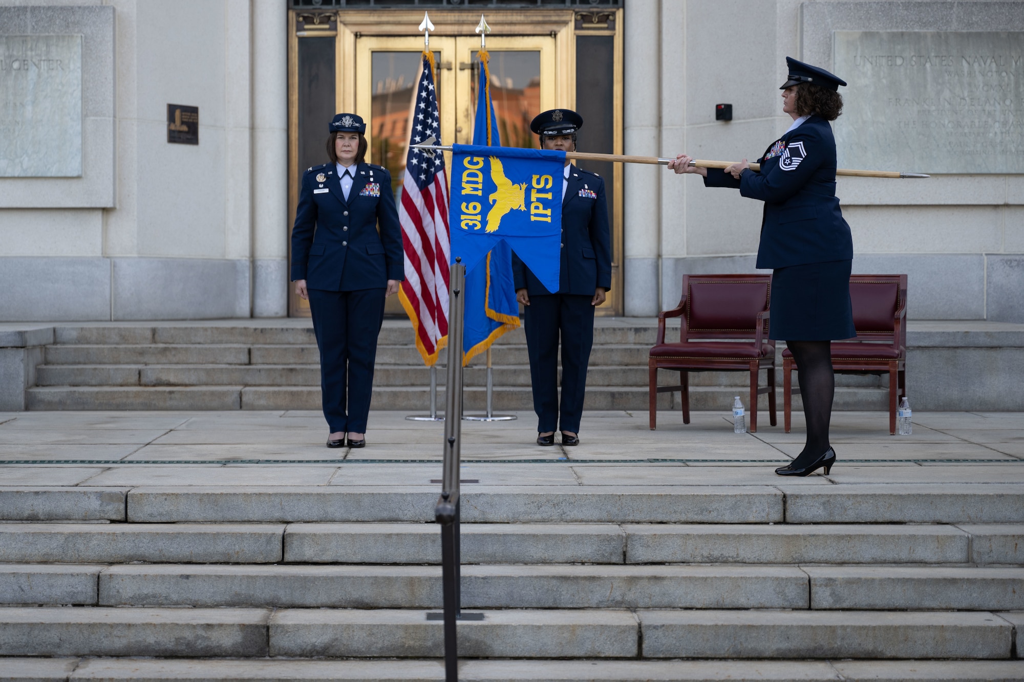 The IPTS guidon is unfurled at the squadron activation.