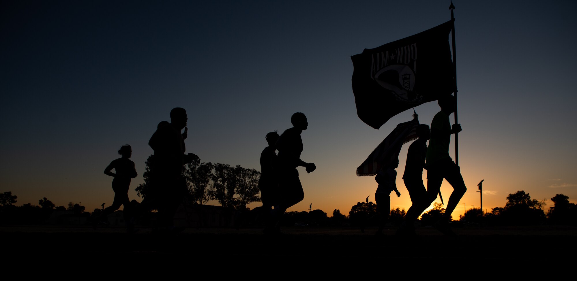 Airmen run on base track