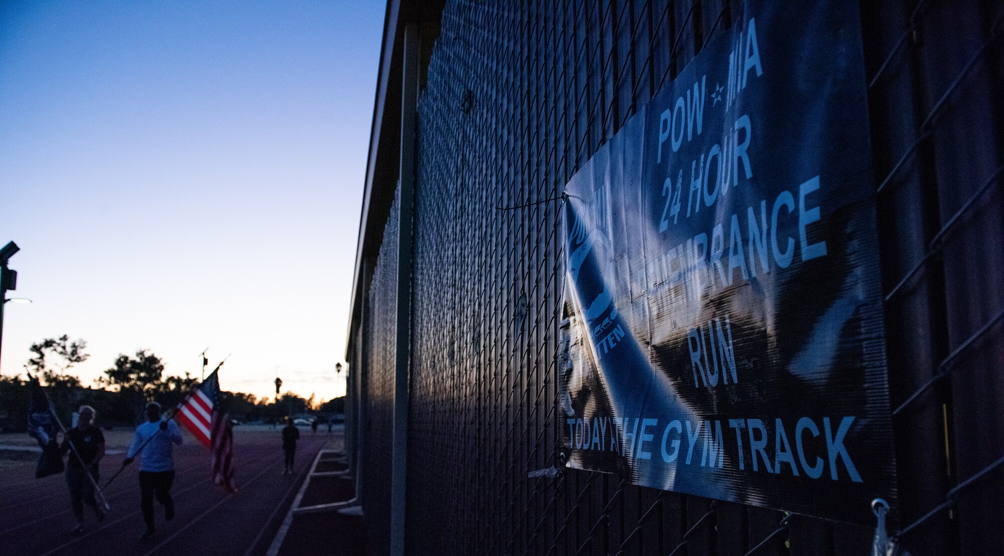 Airmen run on base track
