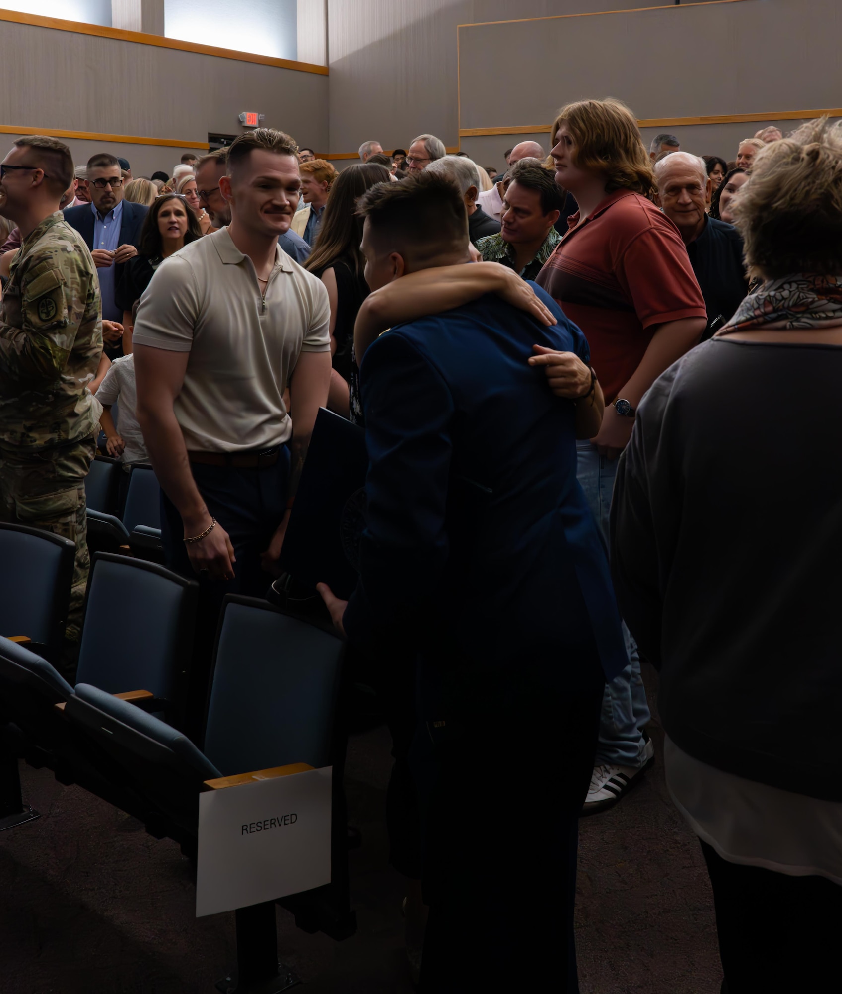 U.S. Air Force Airmen from graduating Class 24-15 present one half of their broken wings to their loved ones at Laughlin Air Force Base, Texas, Sept. 20, 2024. Forty-nine U.S. Air Force officers were awarded silver wings during the ceremony, symbolizing their completion of the Undergraduate Pilot Training program. (U.S. Air Force photo by Airman 1st Class Harrison Sullivan)