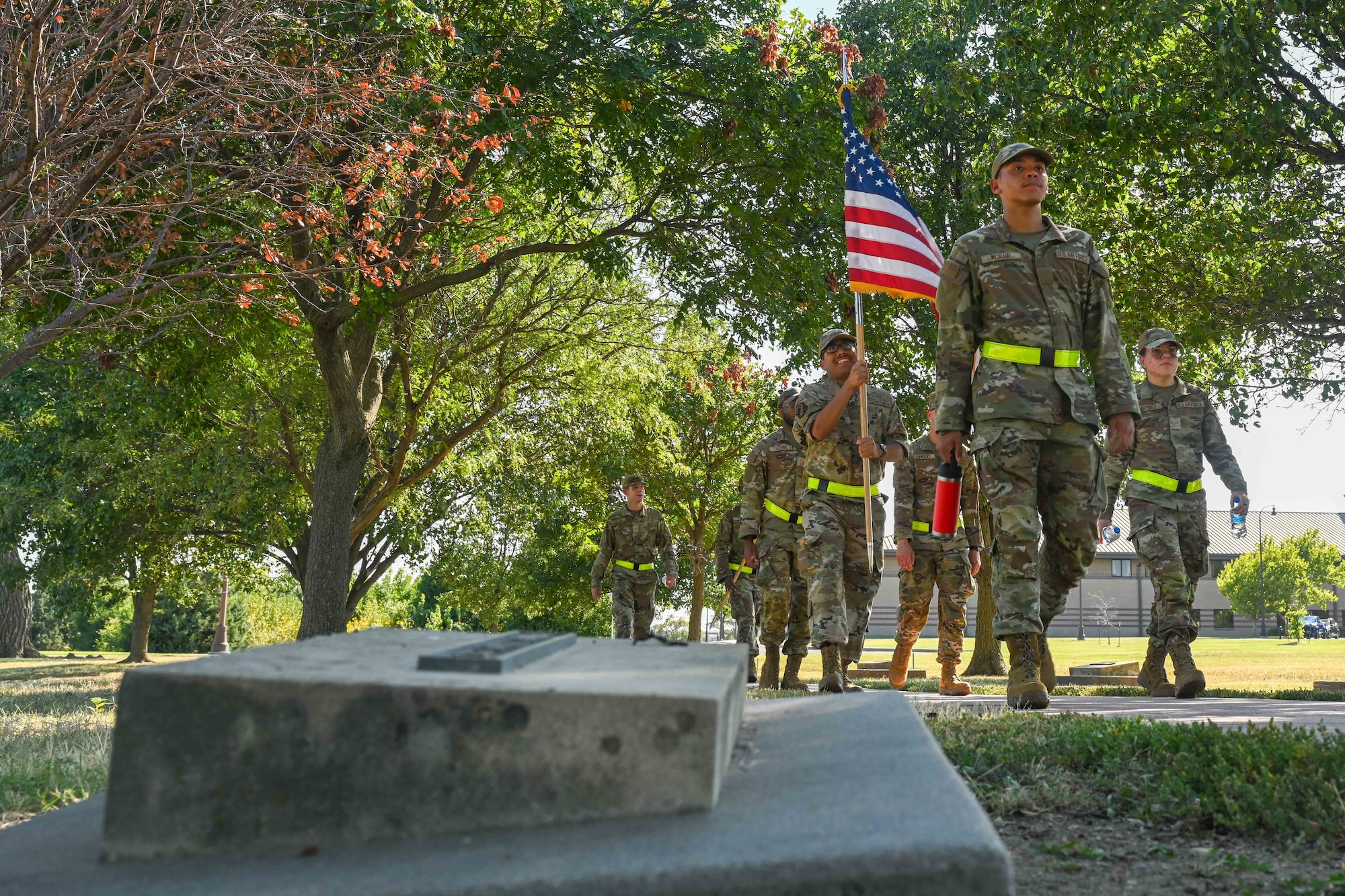Airmen from Team McConnell participate in the POW/MIA remembrance week 24-hour Vigil Walk/Run Sept. 18, 2024, at McConnell Air Force Base, Kansas. The week honors more than 81,500 U.S. service members who remain unaccounted for. (U.S. Air Force photo by Senior Airman William Lunn)