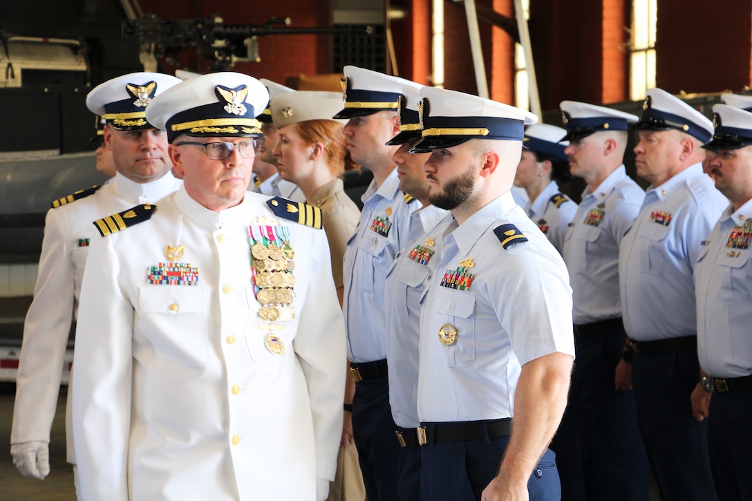 Cmdr. Todd A. Remusat (front) and Cmdr. Kristopher J. Nolan (back) conduct a personnel inspection during the Coast Guard Port Security Unit 309 change of command ceremony in Port Clinton, Ohio, Sept. 21, 2024. Nolan assumed command during the ceremony, becoming the 11th commanding officer in the unit's history. (U.S. Coast Guard photo by Petty Officer 2nd Class Joshua Sanchez)