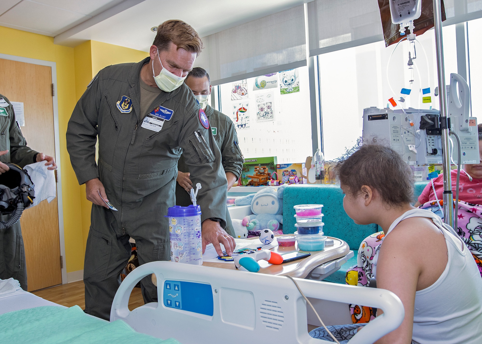 39th FTS instructor pilot gives patch to child