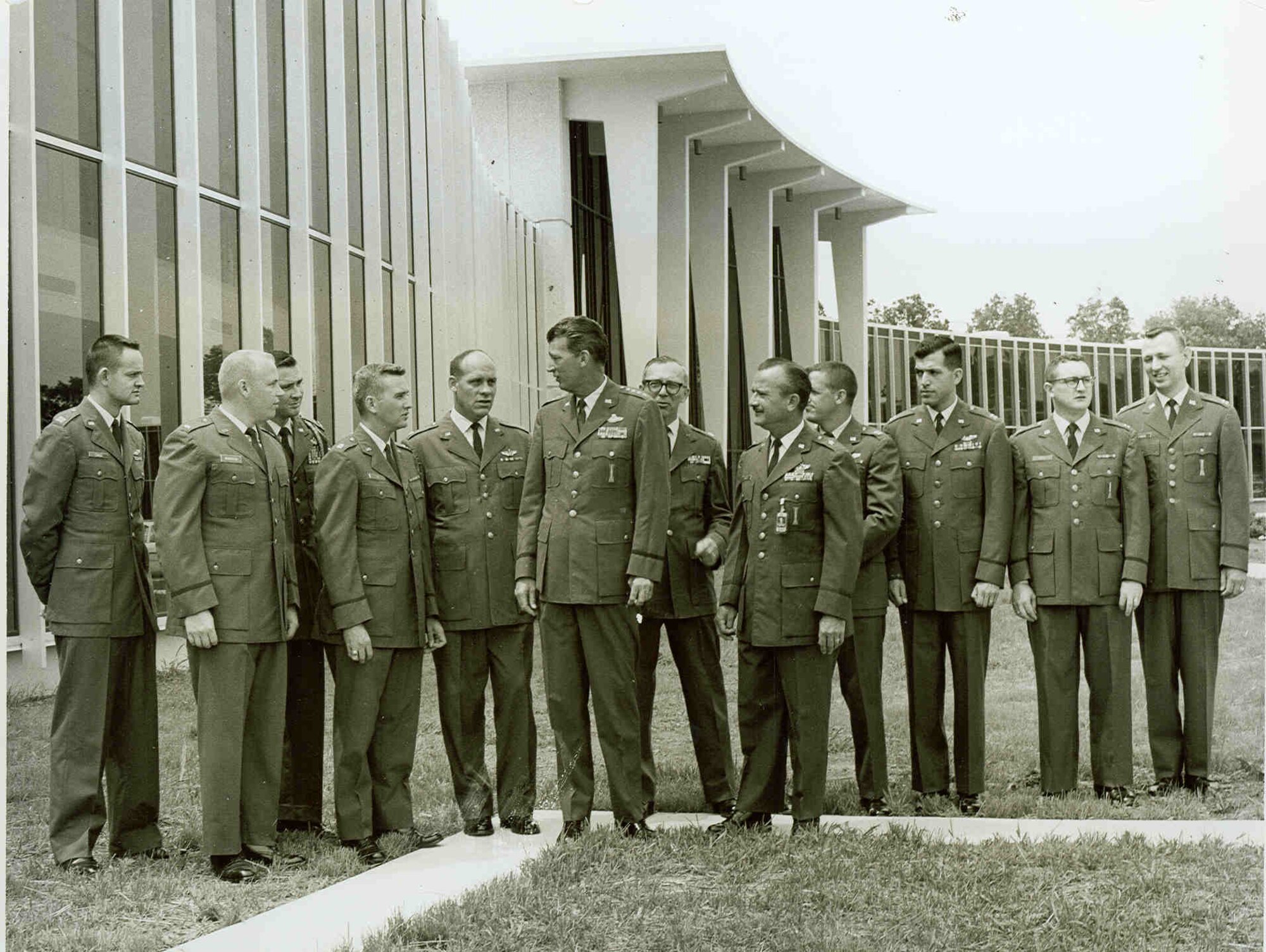 Gen. Bernard Schriever, commander of the Air Force Systems Command, sixth from left, and then-Arnold Engineering Development Center Commander Brig. Gen. Lee Gossick, fifth from right, are photographed in 1966 with a group of U.S. Air Force officers attending the University of Tennessee Space Institute as full-time students. The first UTSI classes began on Sept. 24, 1964, in offices provided by the Air Force at Arnold Air Force Base, Tenn., headquarters of Arnold Engineering Development Complex. In November 1965, the first classes were held on the UTSI campus, which is now situated across 365 acres of property near Arnold AFB. (U.S. Air Force photo)