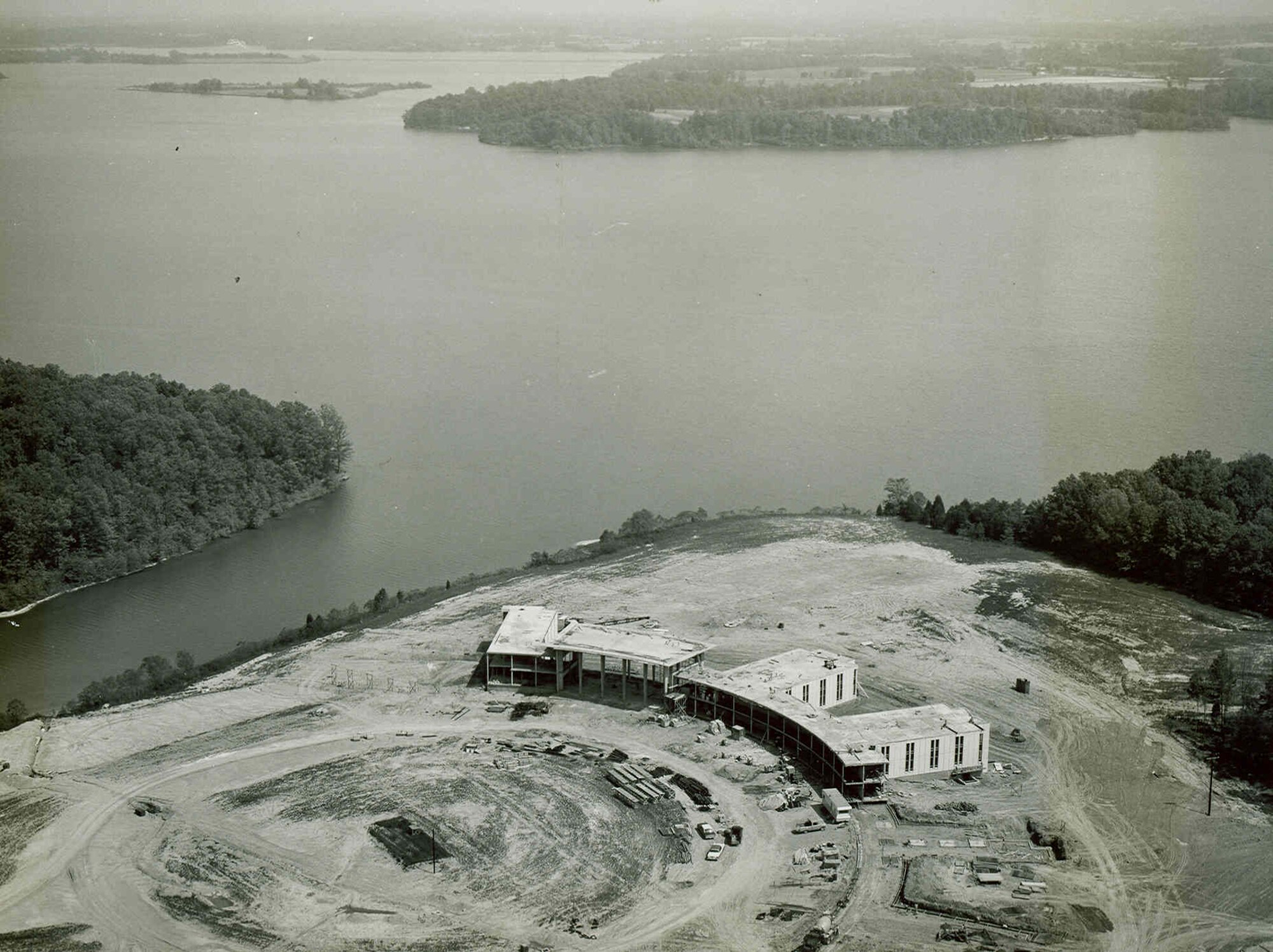 This aerial view shows the University of Tennessee Space Institute under construction in 1965. The first UTSI classes began on Sept. 24, 1964, in offices provided by the Air Force at Arnold Air Force Base, Tenn., headquarters of Arnold Engineering Development Complex. In November 1965, the first classes were held on the UTSI campus, which is now situated across 365 acres of property near Arnold AFB. (U.S. Air Force photo)