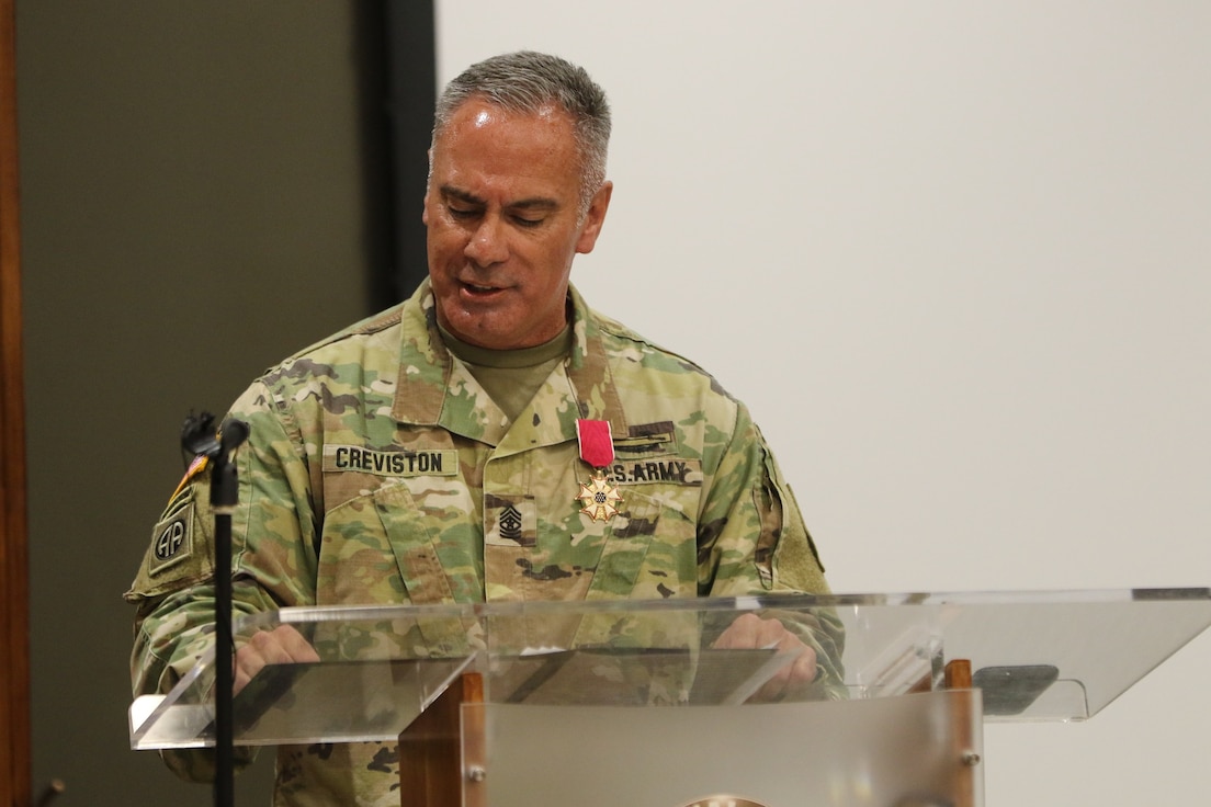 Sgt. Maj. Russell Creviston, G-3 sergeant major, Illinois Army National Guard, offers humorous advice to fellow Soldiers during a retirement ceremony Sept. 18 at the Illinois Military Academy, Camp Lincoln, Springfield. Creviston, who enlisted in the Illinois Army National Guard in 1992, retired with 32 years of service.