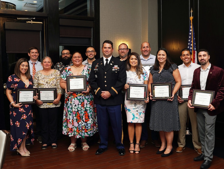 Maj. Matt Westcott Jacksonville District Deputy commander presents the Jacksonville District 2024 Leadership Development Program Class with certificates during a graduation ceremony Sept. 12, 2024, at Maggiano's Little Italy in Jacksonville’s Town Center in Jacksonville, Fla. (USACE Photo by Mark Rankin)