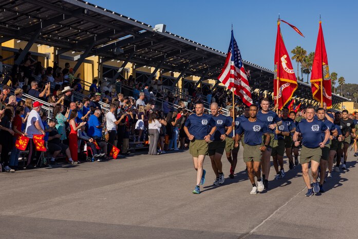 U.S. Marines with Recruit Training Regiment, Marine Corps Recruit Depot San Diego, lead a motivational run at MCRD San Diego, California, Sept. 5, 2024. The company motivational run is a three-mile cadence run conducted around the Depot and is the last physical training event the Marines will conduct before they graduate from MCRD San Diego. The event is also the first-time friends and families will see their newly transformed Marines. (U.S. Marine Corps photo by Lance Cpl. Jacob Hutchinson)