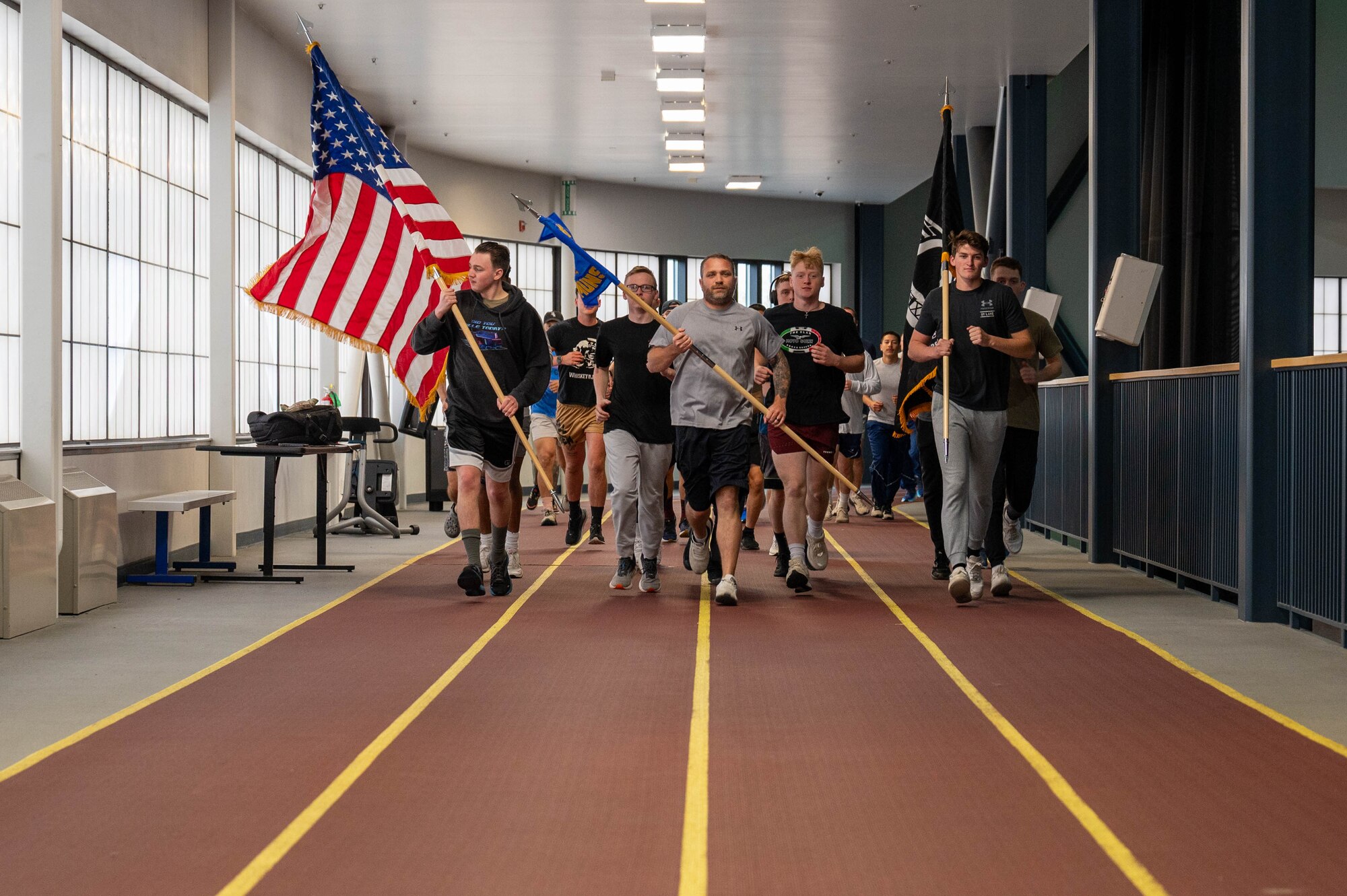 U.S. Air Force Airmen, assigned to the 354th Maintenance Group, run around the track during the 24 hour POW/MIA run at Eielson Air Force Base, Alaska, Sept. 19, 2024.