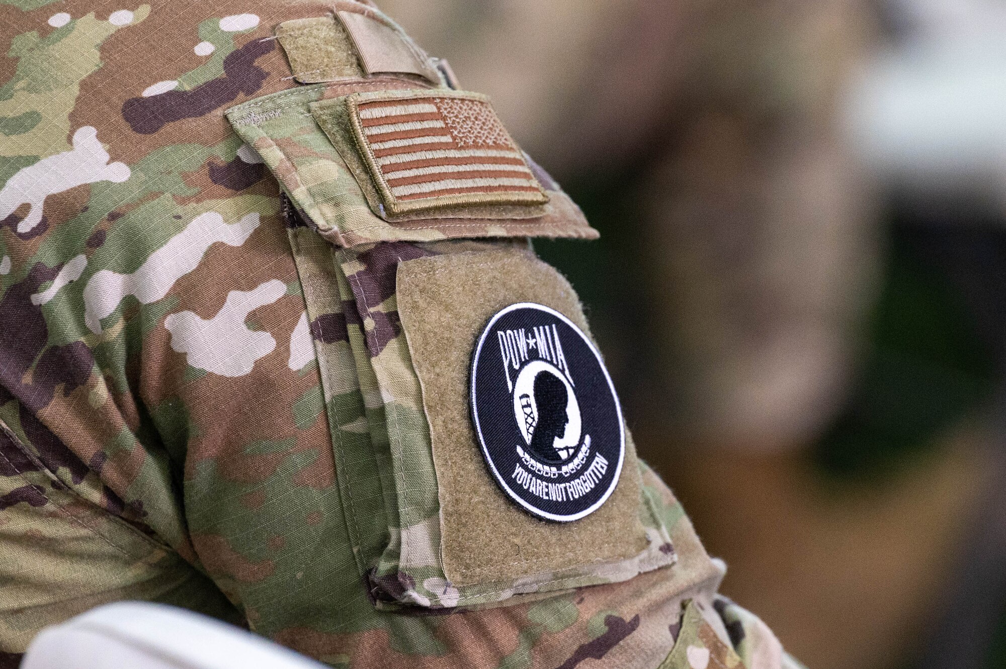 A U.S. Air Force Airman wears a POW/MIA patch during the conclusion of the 24 hour POW/MIA run at Eielson Air Force Base, Alaska, Sept. 20, 2024.