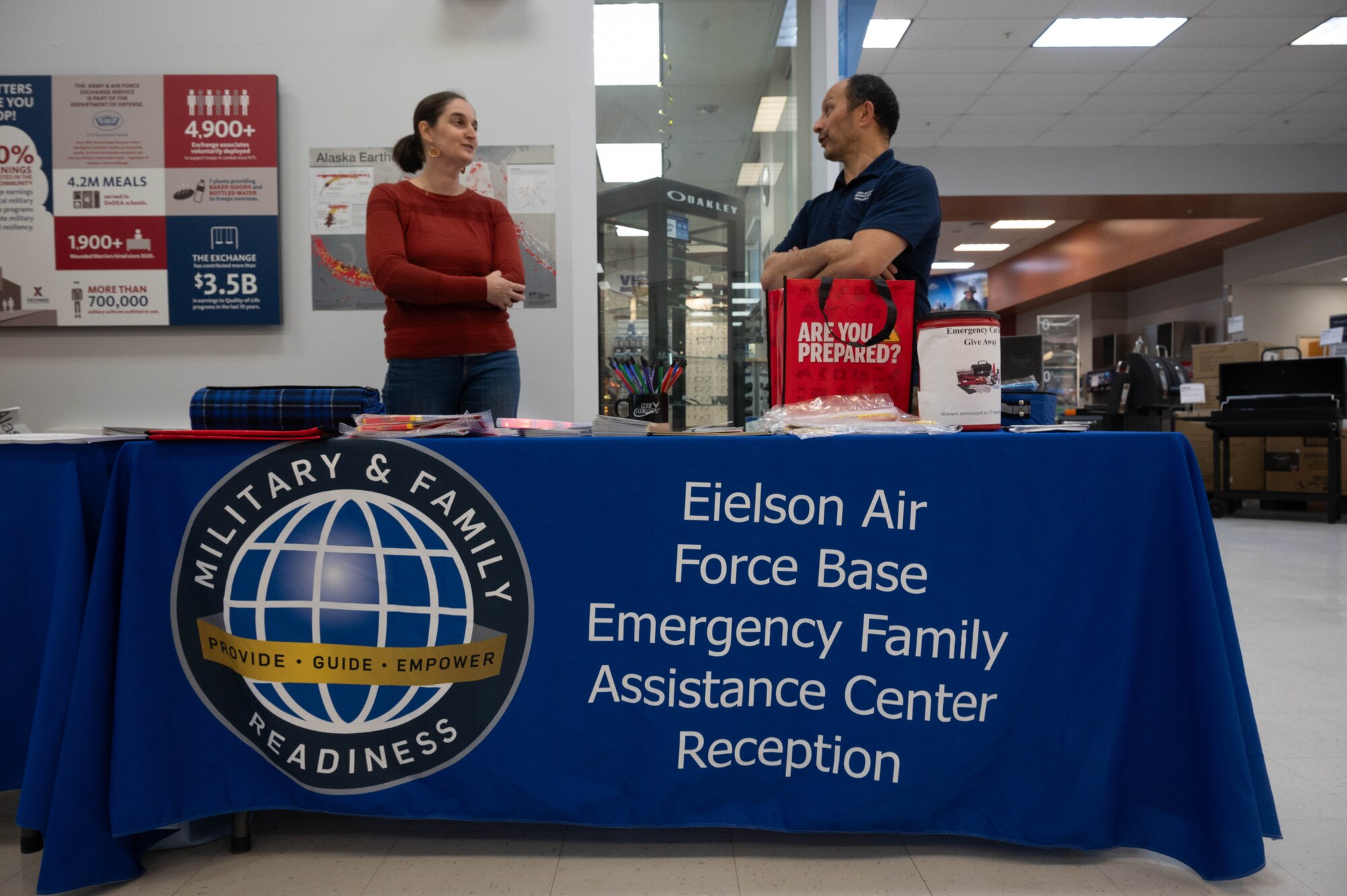 Elizabeth Nadin, Alaska Earthquake Center communications manager, left, and Kevin Francesco, Eielson Military & Family Readiness counselor, talk about their experiences while living in Alaska at Eielson Air Force Base, Alaska, Sept. 19, 2024.