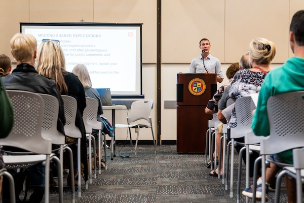 Jonathan Hallemeier, U.S. Army Corps of Engineers Los Angeles District interdisciplinary study manager and study team lead planner, speaks during a public meeting regarding the ongoing San Diego County Shoreline (Oceanside) Mitigation Study Sept. 16 at the Oceanside Civic Center Library in Oceanside, California. The study aims to mitigate shoreline erosion and other impacts, resulting from the construction of U.S. Marine Corps Base Camp Pendleton Harbor.