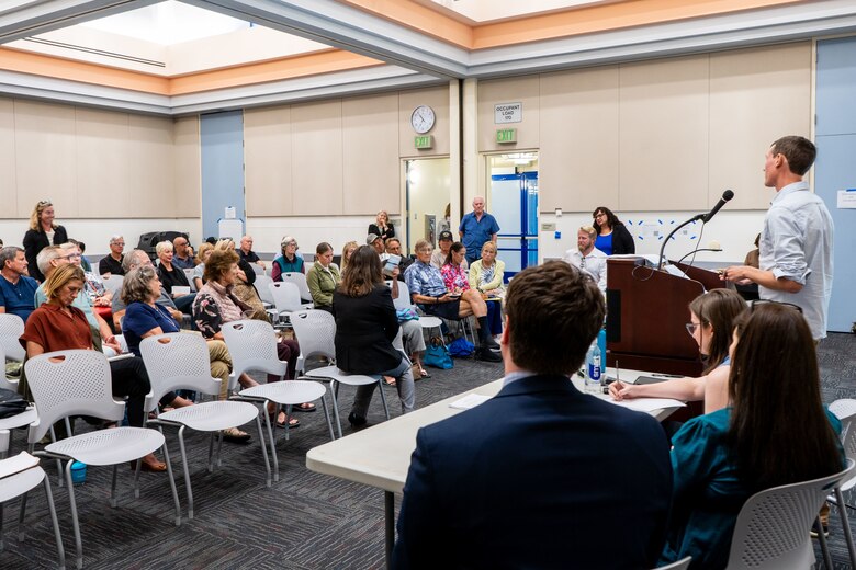 Community members provide comments during a public meeting, regarding the ongoing San Diego County Shoreline (Oceanside) Mitigation Study Sept. 16 at the Oceanside Civic Center Library in Oceanside, California. After the presentation, attendees provided public, verbal comments and spoke face-to-face with members of the study team.
