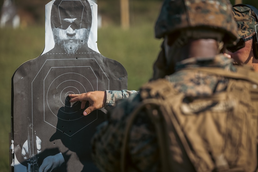 A Marine looks a target.