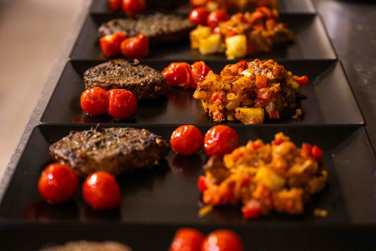 Dishes are plated during the Iron Chef competition.