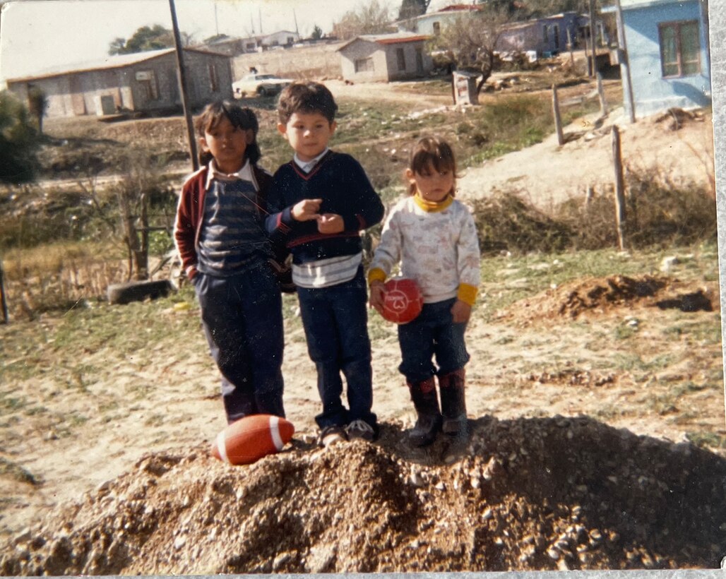 Staff Sgt. Diana Hudson spent her early childhood in a small Mexican border town where she lived in a house built from pallets.