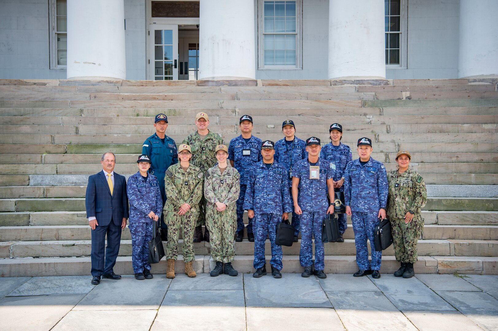 Group shot of NMCP personnel and staff from the Japanese training ships S Kashima and JS Shimakaze.