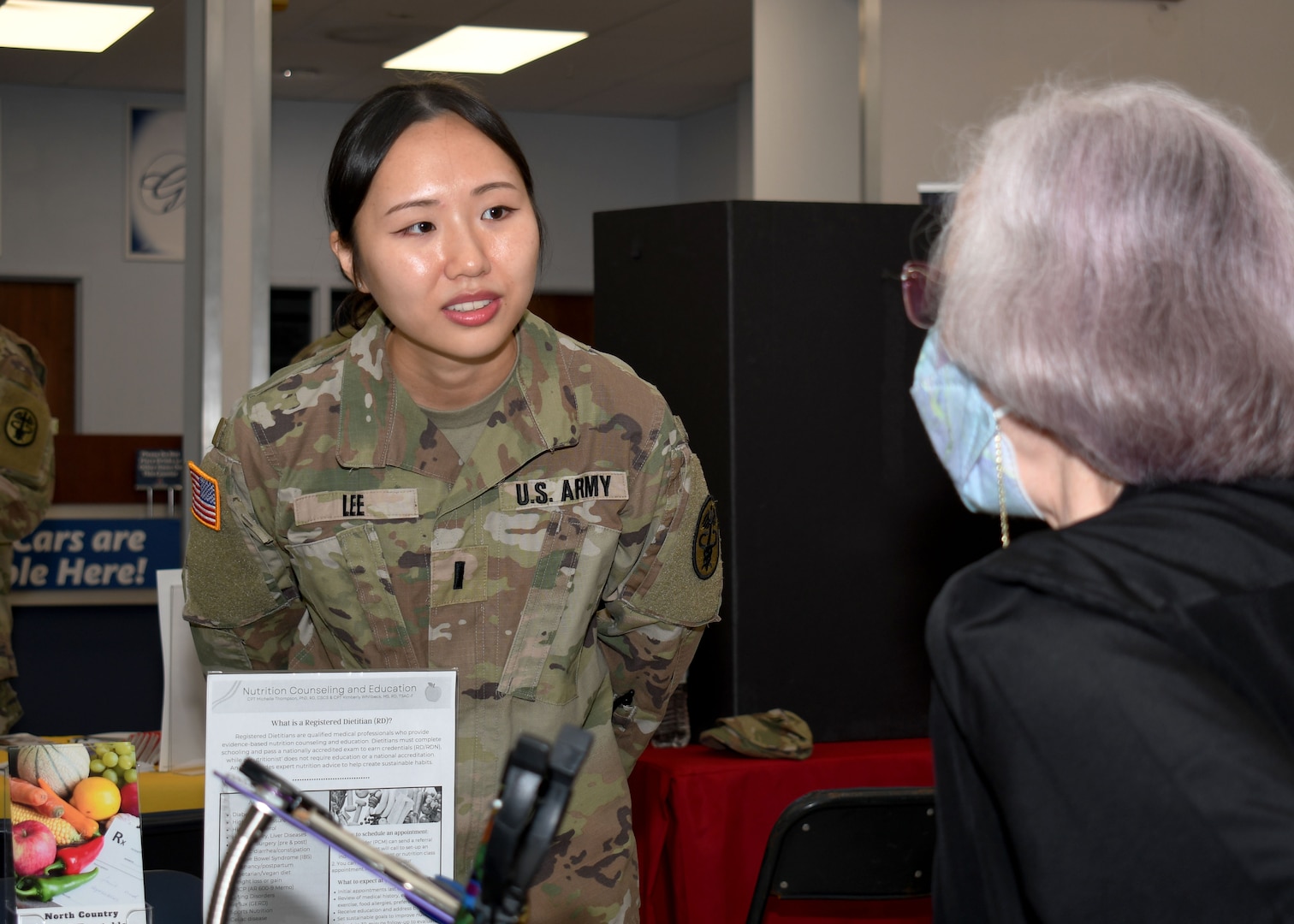 1st Lt. Alicia M. Lee, a dietitian with the U.S. Army Medical Department Activity – Fort Drum, provides nutrition information to a retiree during the Fort Drum Retiree Appreciation Day at Fort Drum, N.Y., Sept. 21, 2024.