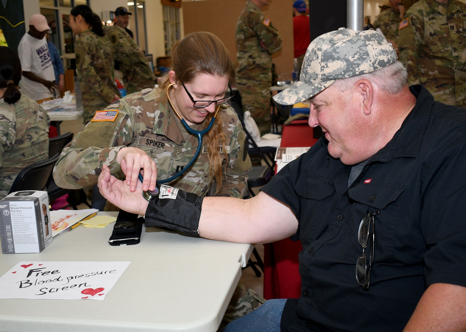 Capt. Christine M. Spiker, a family medicine physician with the U.S. Army Medical Department Activity – Fort Drum, tests a military retiree’s blood pressure during the Fort Drum Retiree Appreciation Day at Fort Drum, N.Y., Sept. 21, 2024.