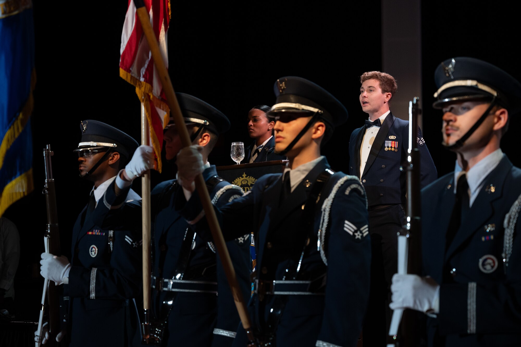 U.S. Air Force Honor Guard members assigned to Joint Base McGuire-Dix-Lakehurst, N.J., post the colors as the National Anthem was sung during the U.S. Air Force Ball in Atlantic City, N.J., Sept. 21, 2024. The annual event honors the U.S. Air Force’s heritage of air and space dominance. (U.S. Air Force photo by Senior Airman Aidan Thompson)
