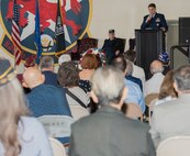 Deputy commander assigned to the 57th Wing, gives opening remarks during a Prisoner of War and Missing in Action (POW/MIA) recognition ceremony