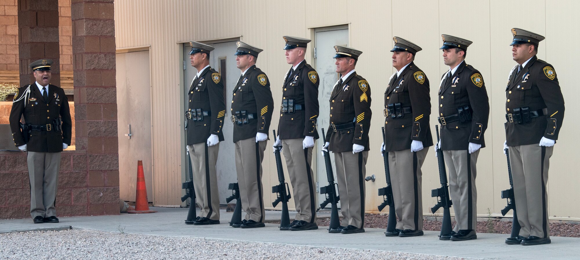 Police officers from the Las Vegas Metropolitan Police Department Honor Guard, prepare for a 21- gun salute during a National Prisoner of War and Missing in Action (POW/MIA) Recognition Ceremony