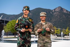 Indonesian Air Force Academy Cadet Major Salma El Mutafaqqiha Putri and U.S. Air Force Academy Cadet 1st Class Michelle Cabonce are pictured on the Terrazzo during International Week 2024 Sept. 9-13.