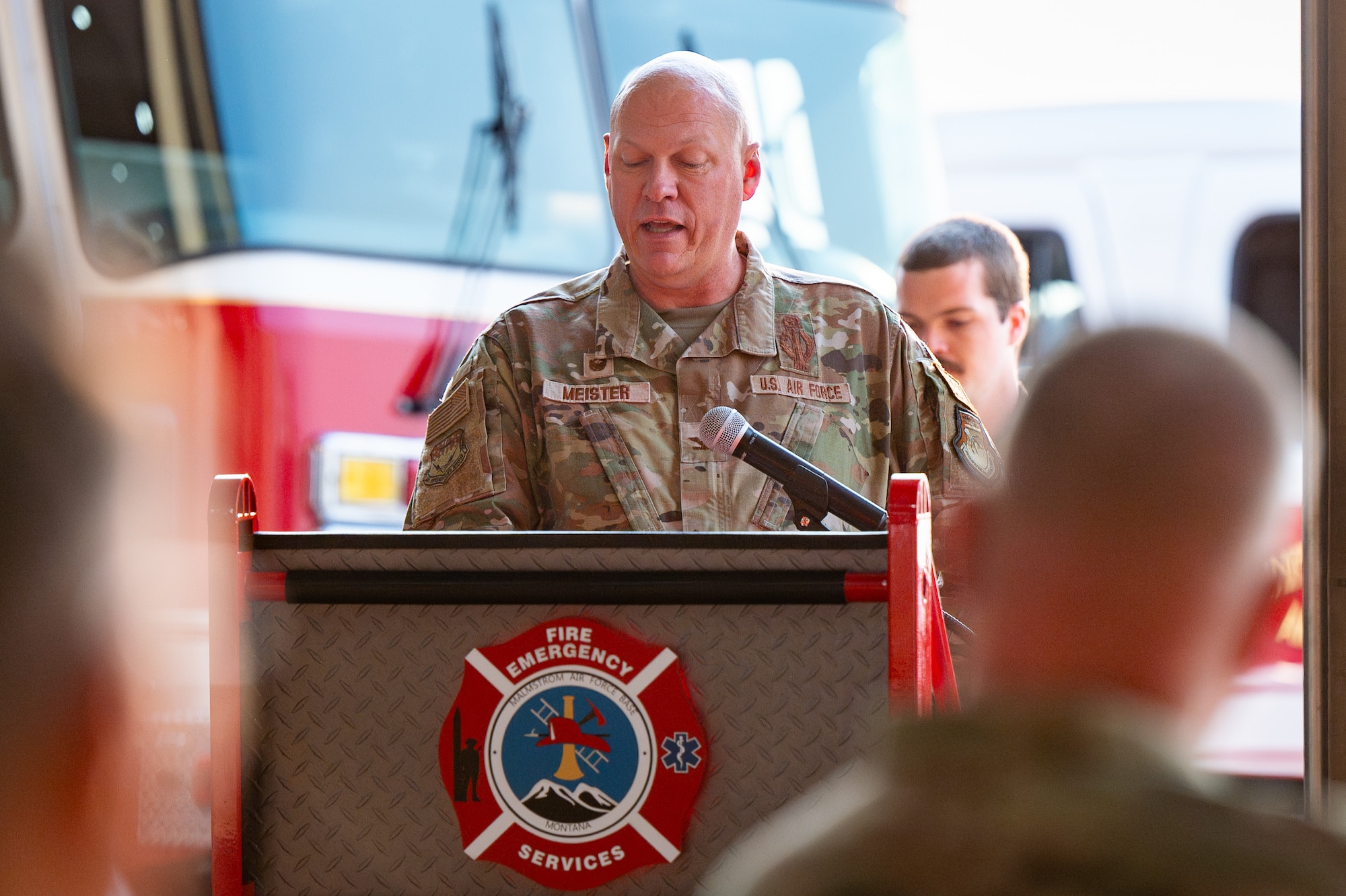 Uniformed personnel participate in a ceremony.