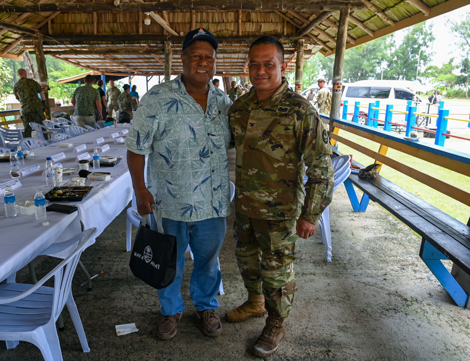 U.S. Army Col. Manny Duenas, Guam National Guard State Partnership Program director, poses with Governor Emais Roberts, Peleliu state government, at the Peleliu South Dock, Republic of Palau, Sept. 17, 2024. This was the first Joint Committee Meeting that the Guam National Guard attended as a state partner to Palau. (U.S. Air Force photo by Airman 1st Class Natasha Ninete).