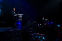 U.S. Air Force Col. Keagan McLeese, 9th Reconnaissance Wing (9th RW) commander (left), and Chief Master Sgt. Steven Creek, 9th RW command chief master sgt., speak during the Beale Air Force Ball 2024 commemorating the 77th birthday of the U.S. Air Force at Wheatland, California, September 12, 2024.