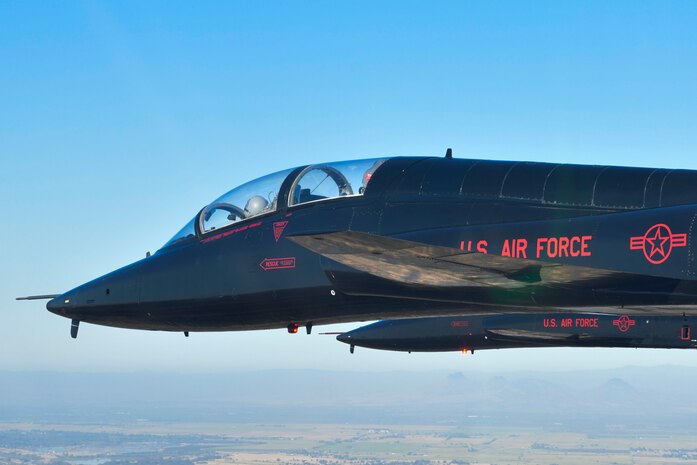 U.S. Air Force 1st Reconnaissance Squadron T-38 Talons perform a missing-man formation flyover of Beale Air Force Base, California Sept. 11, 2024.