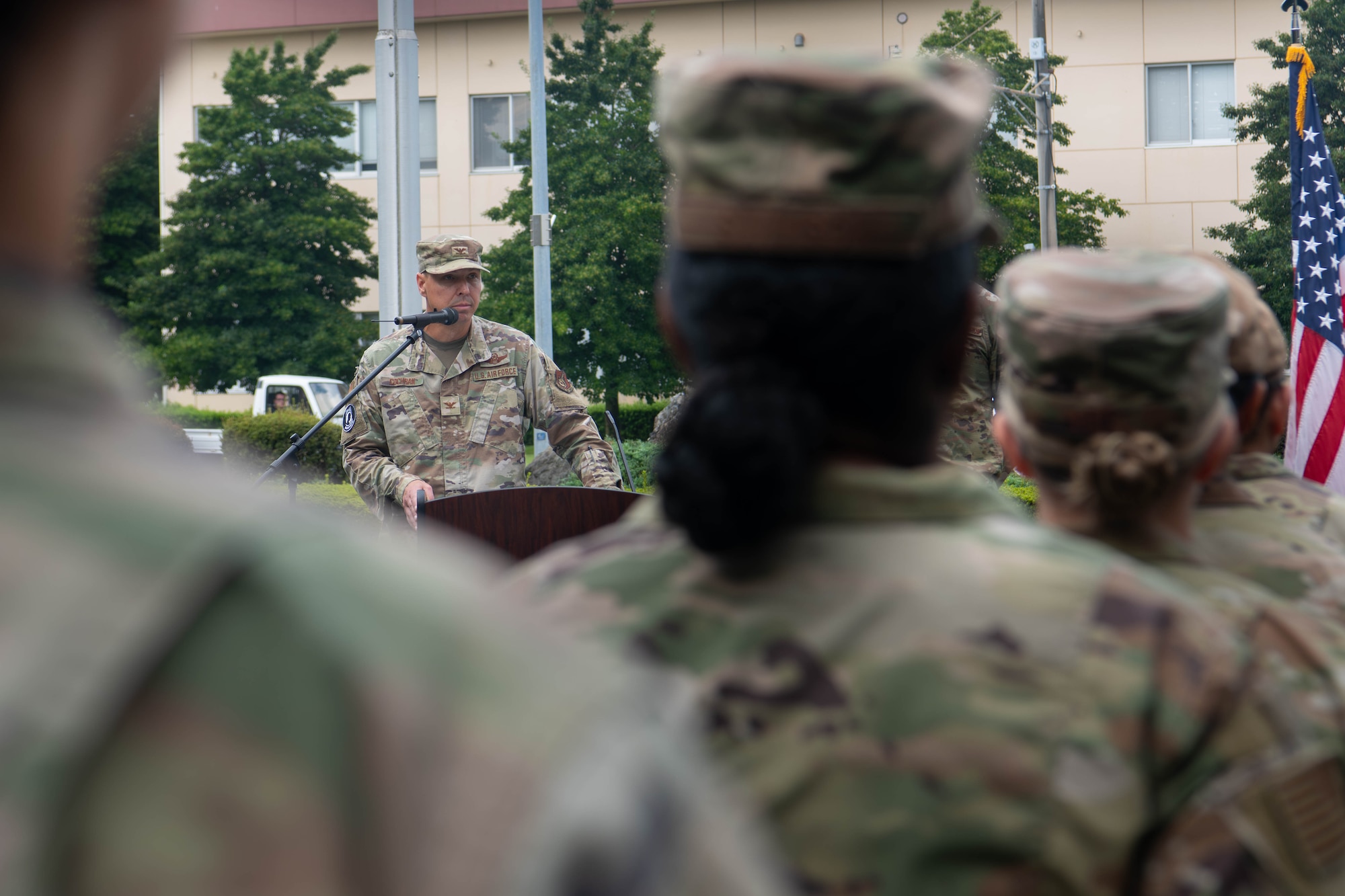 U.S. Air Force Col. Brett Cochran, 374th Airlift Wing deputy commander, gives final remarks at the National POW/MIA Recognition Day closing ceremony.