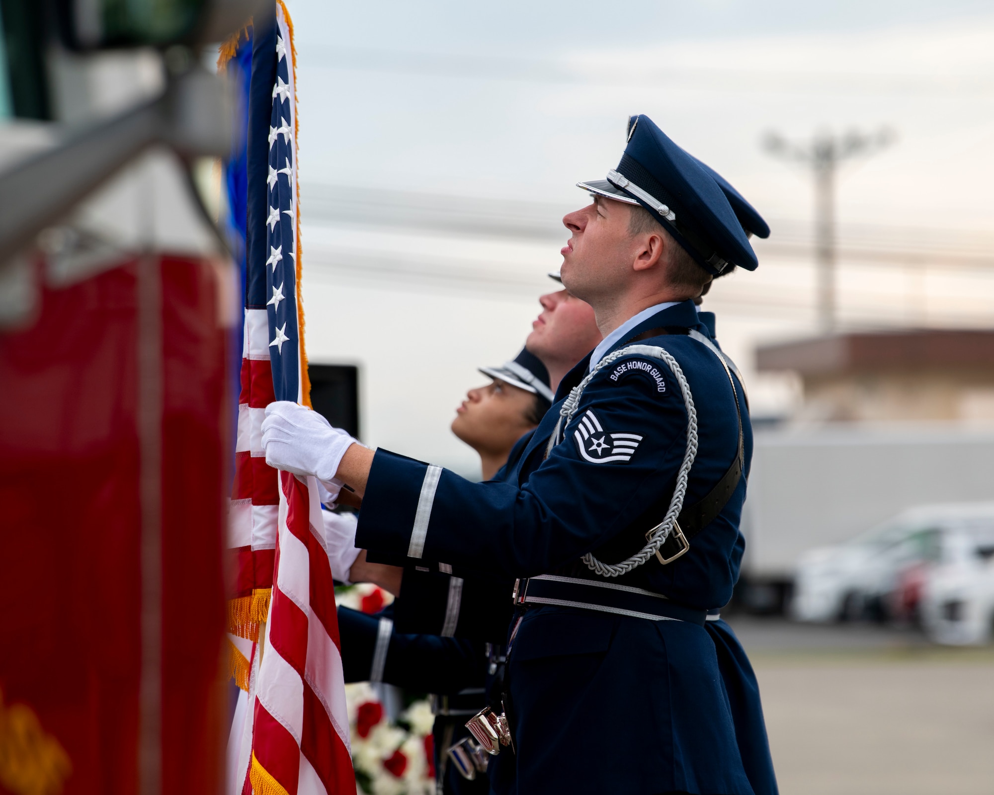 Members of the Yokota Air Base Honor Guard inspect the flags during the National POW/MIA Recognition Day opening ceremony.